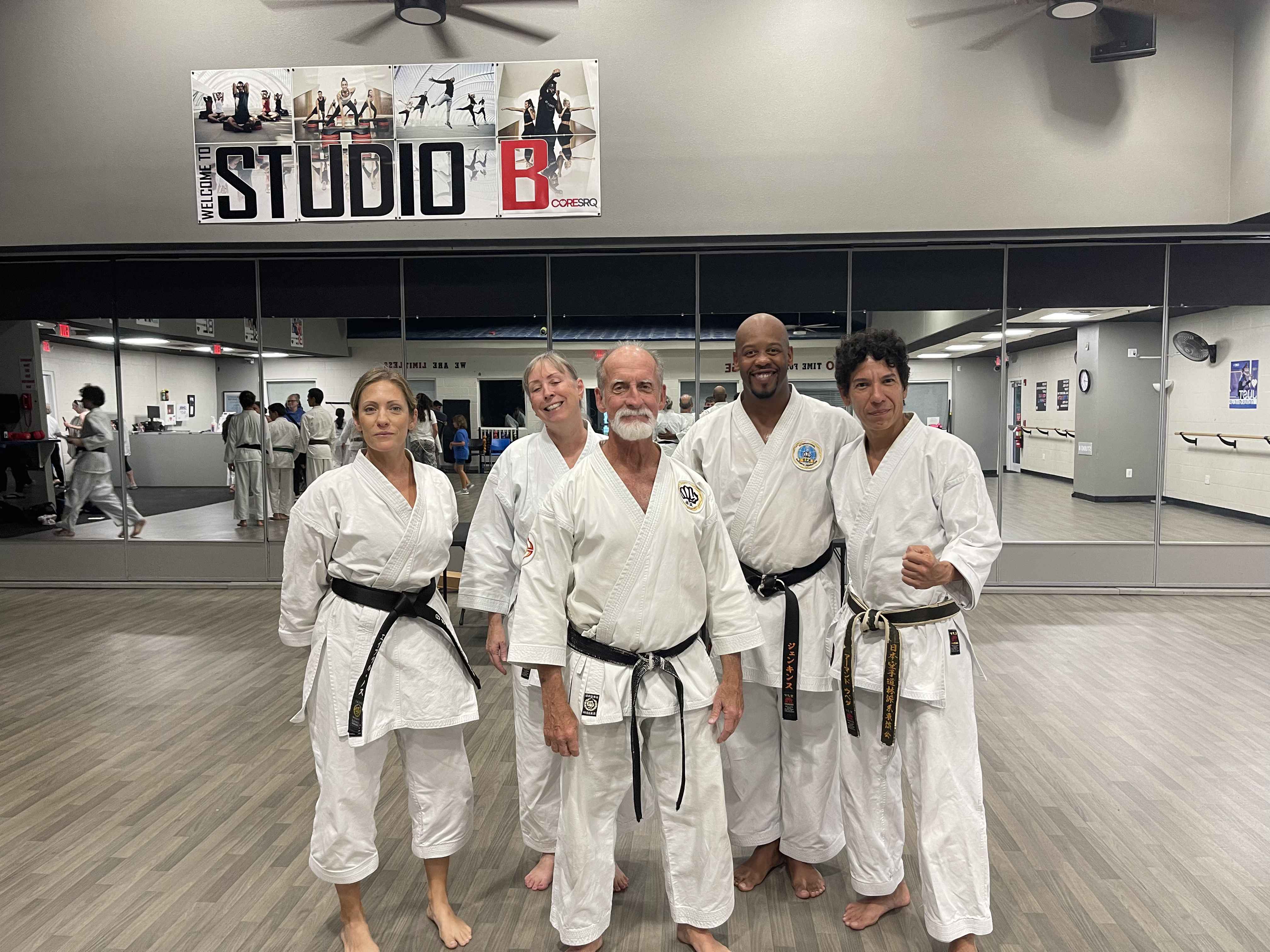 Sensei Jenkins with fellow black belts after a training seminar